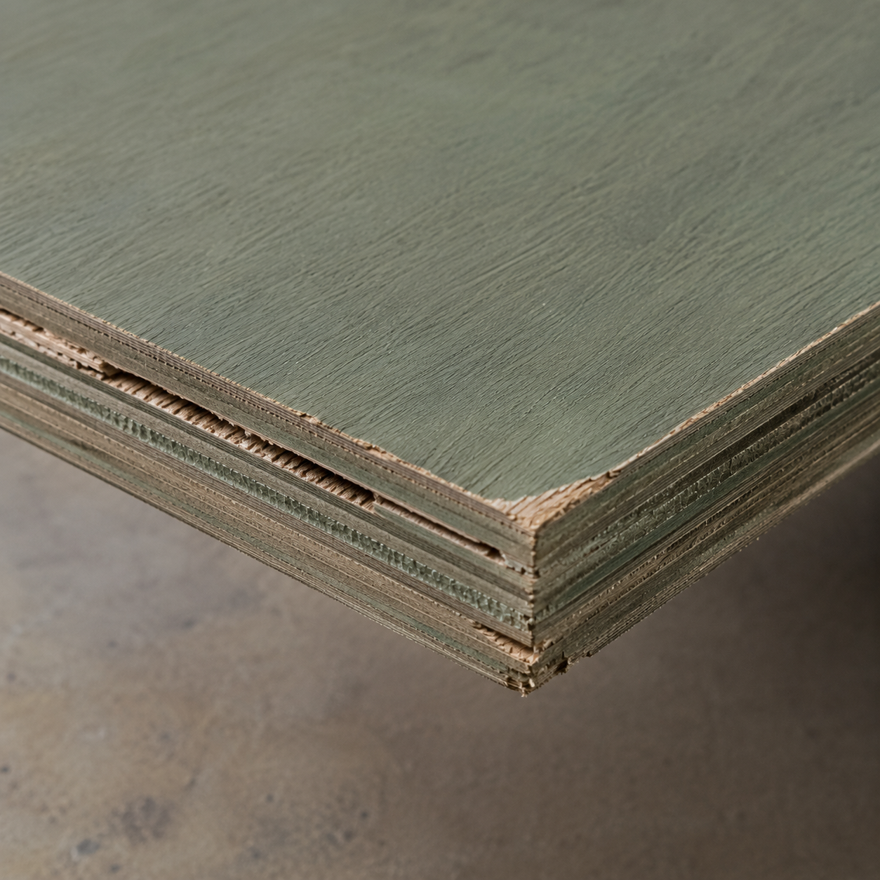 WoodCore before repair - damaged plyboard edge